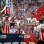 Sunderland players celebrate winning promotion